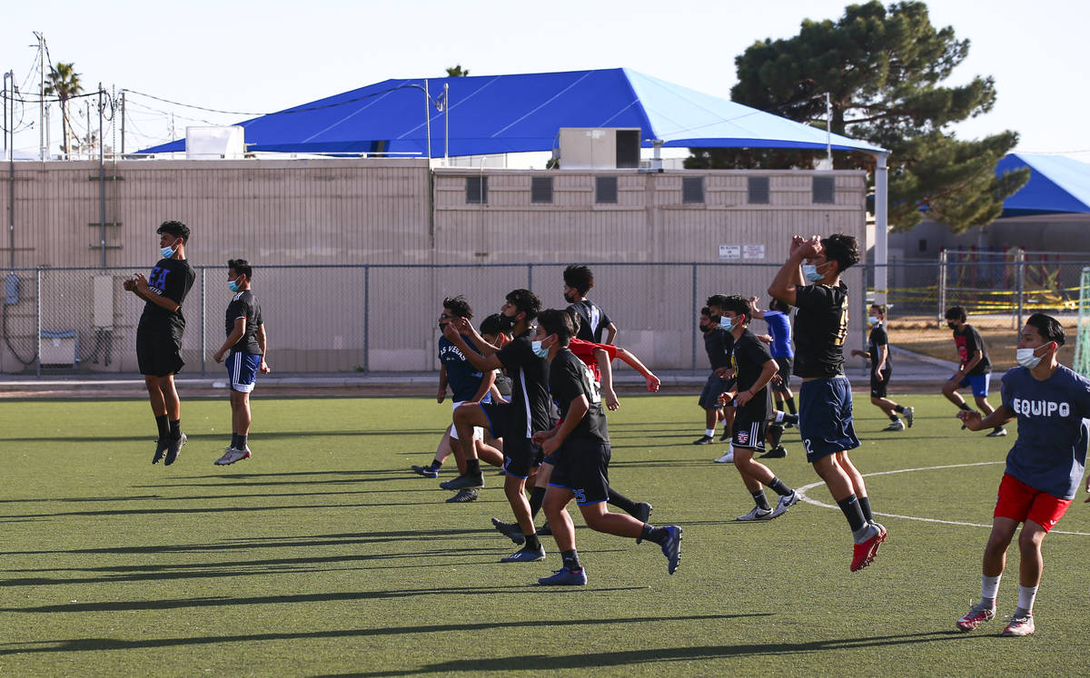 Equipo Academy soccer players warm up at the start of practice at Mike Morgan Park in Las Vegas ...