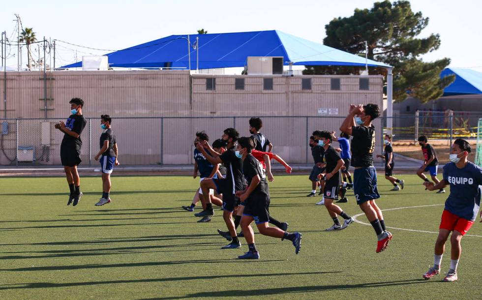 Equipo Academy soccer players warm up at the start of practice at Mike Morgan Park in Las Vegas ...