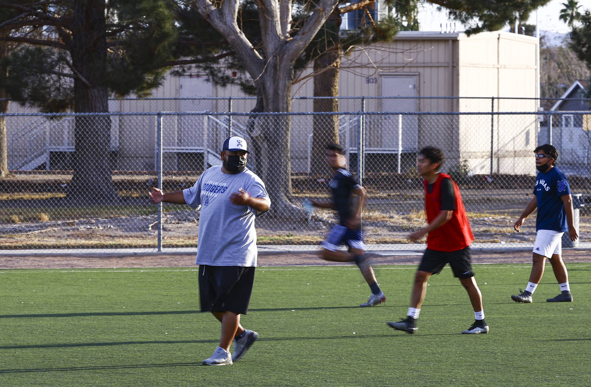 Equipo Academy coach Horacio Ortiz helps lead soccer practice at Mike Morgan Park in Las Vegas ...