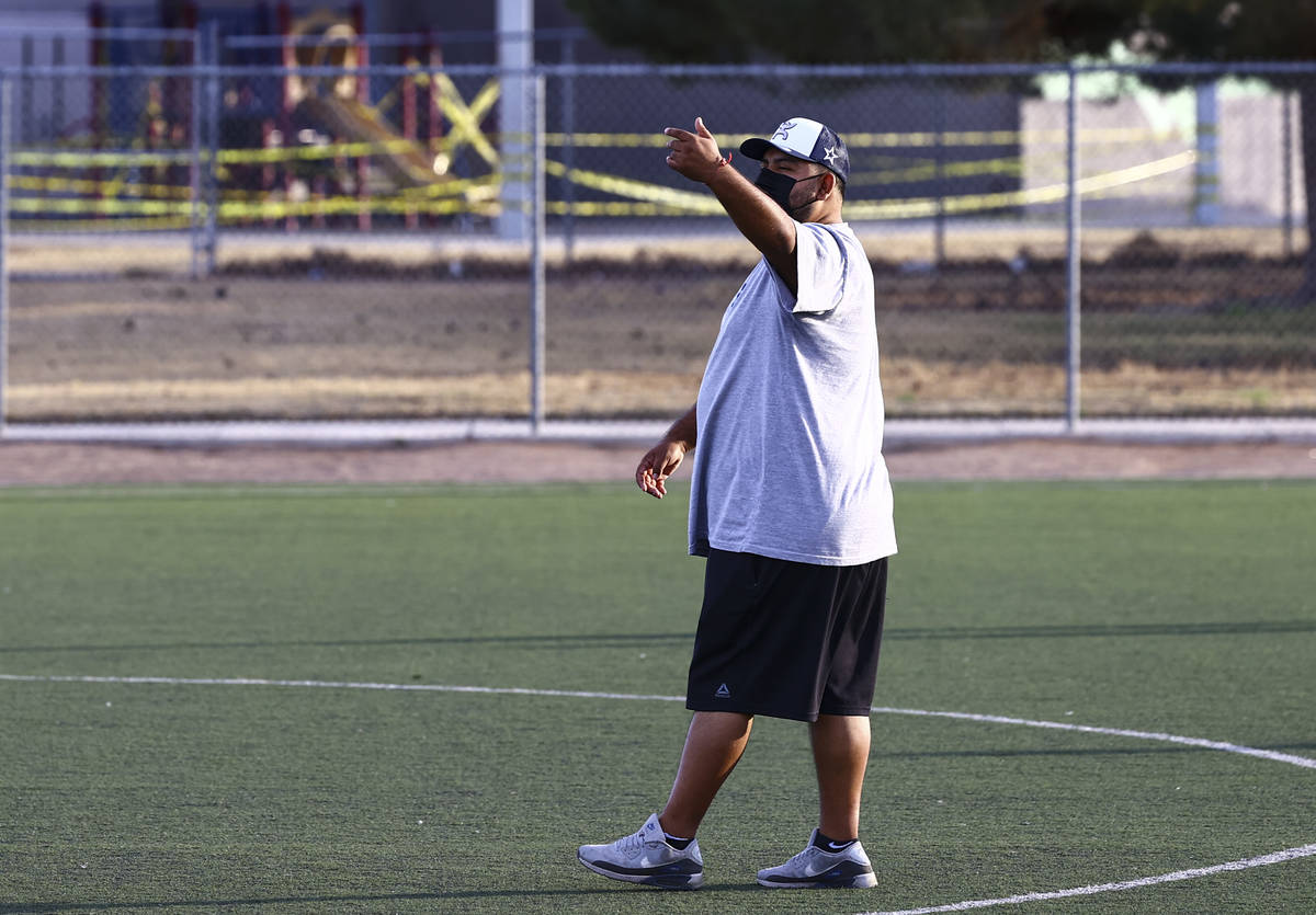 Equipo Academy coach Horacio Ortiz helps lead soccer practice at Mike Morgan Park in Las Vegas ...