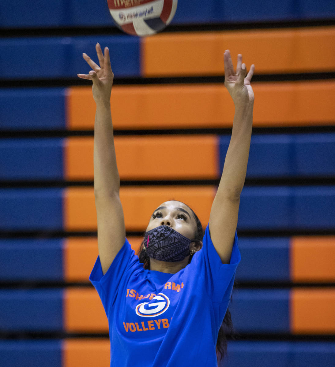Sofia Elowefo sets the ball during a varsity girls volleyball practice at Bishop Gorman High Sc ...