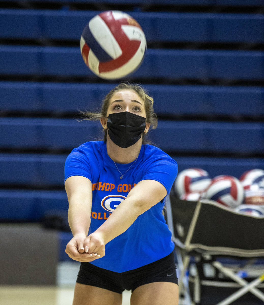 Morgan Mixer returns the ball during a varsity girls volleyball practice at Bishop Gorman High ...