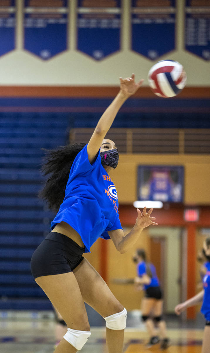 Sofia Elowefo spikes the ball during a varsity girls volleyball practice at Bishop Gorman High ...