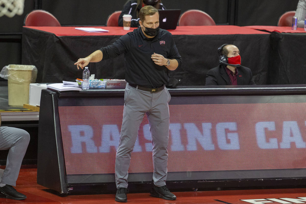UNLV Rebels head coach T.J. Otzelberger instructs the team during the second half of an NCAA me ...