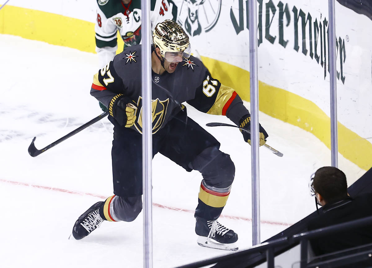 Golden Knights left wing Max Pacioretty (67) celebrates after scoring a goal in overtime to def ...