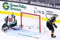 Golden Knights left wing Max Pacioretty (67) scores a goal in overtime past Minnesota Wild goal ...