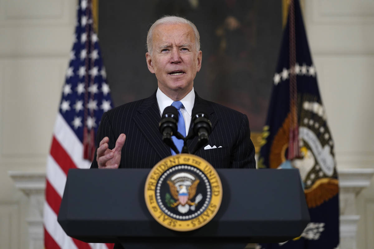 President Joe Biden speaks about efforts to combat COVID-19, in the State Dining Room of the Wh ...