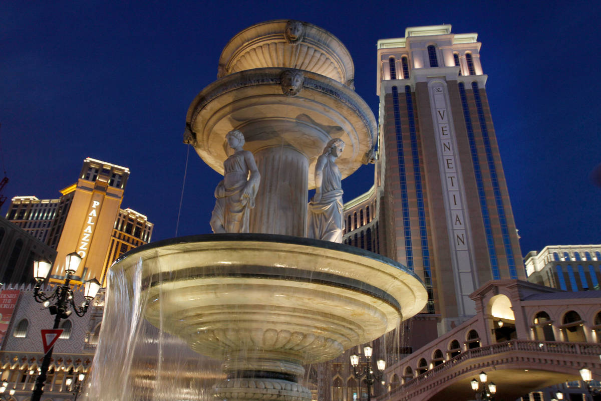 This Nov. 21, 2020, file photo shows The Palazzo and The Venetian on the Las Vegas Strip. (Chit ...