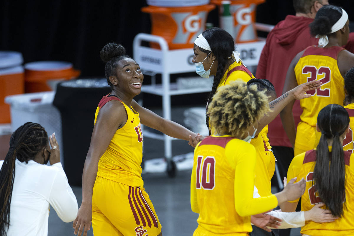 USC Trojans forward Jordan Sanders (5) looks at the playback of herself scoring a point against ...