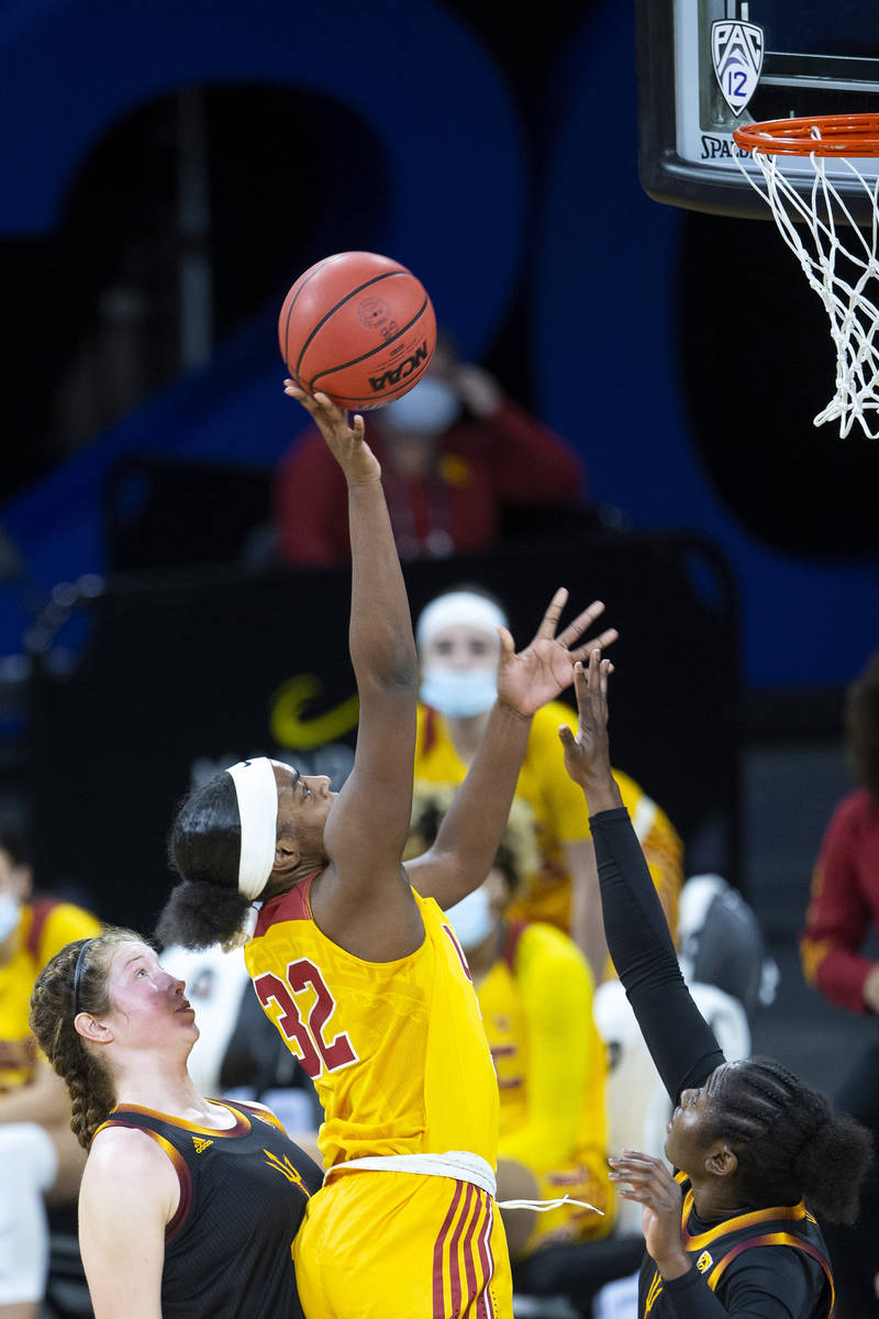 USC Trojans forward Jordyn Jenkins (32) shoots a point as Arizona State Sun Devils guard Maggie ...