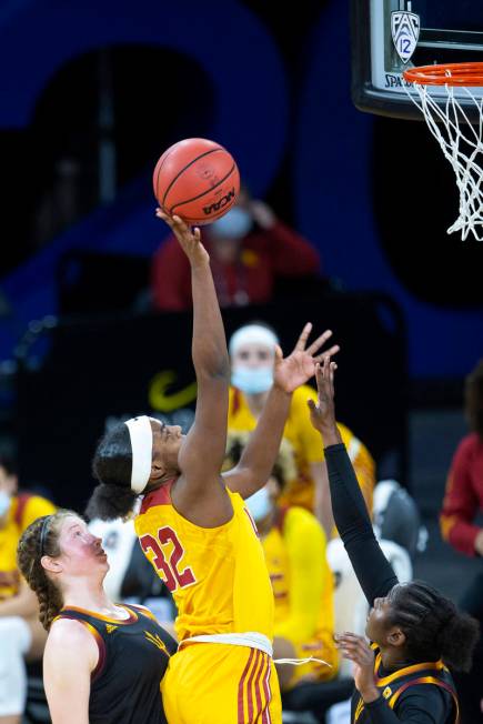 USC Trojans forward Jordyn Jenkins (32) shoots a point as Arizona State Sun Devils guard Maggie ...