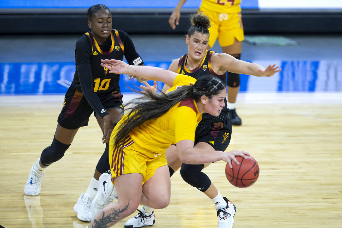 Arizona State Sun Devils guard Iris Mbulito (10) and Arizona State Sun Devils guard Taya Hanson ...