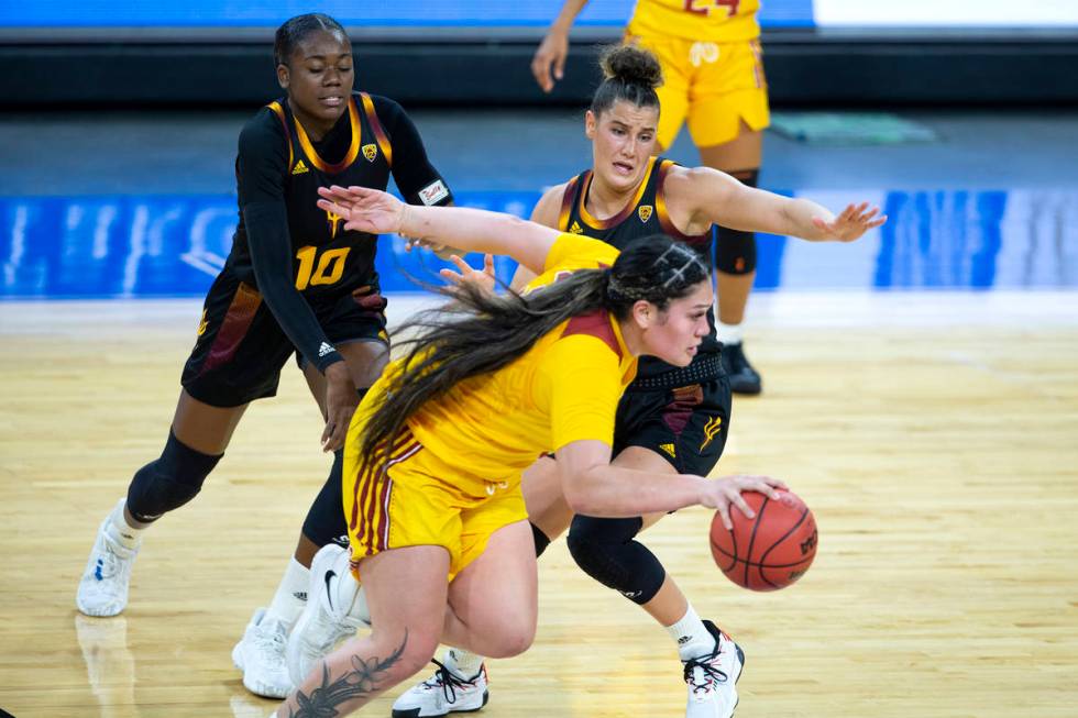 Arizona State Sun Devils guard Iris Mbulito (10) and Arizona State Sun Devils guard Taya Hanson ...