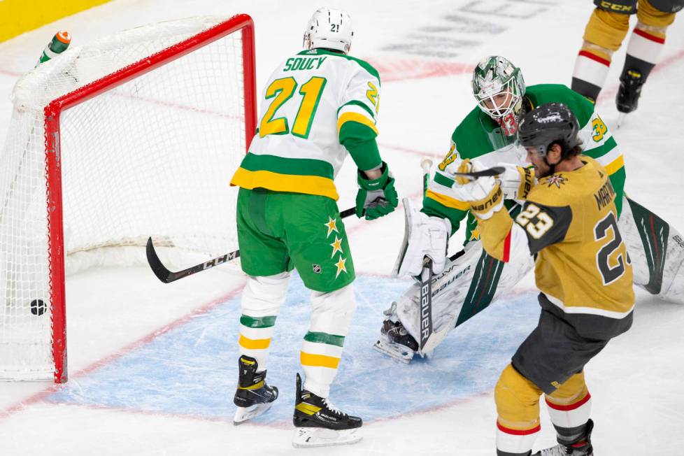 Wild goaltender Cam Talbot (33) lets in a goal shot by Golden Knights right wing Mark Stone (61 ...