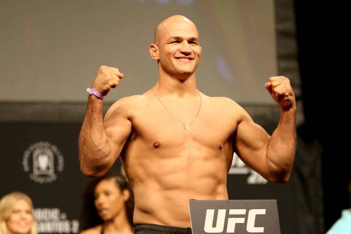 Junior Dos Santos poses for photographers during a weigh-in before UFC 211 on Friday, May 12, 2 ...