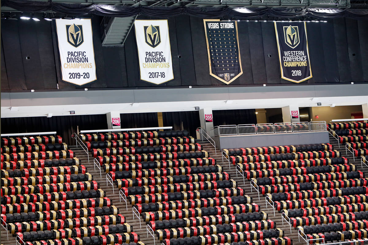 The ÒVegas StrongÓ banner, second from right, is seen at T-Mobile Arena in Las Vegas, ...