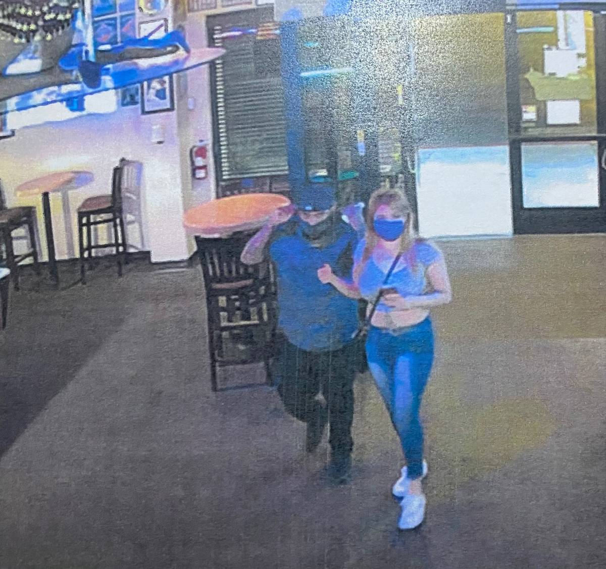 An evidence photo shows Erick Rangel-Ibarra and Lesly Palacio inside the Bourbon Street Bar at ...