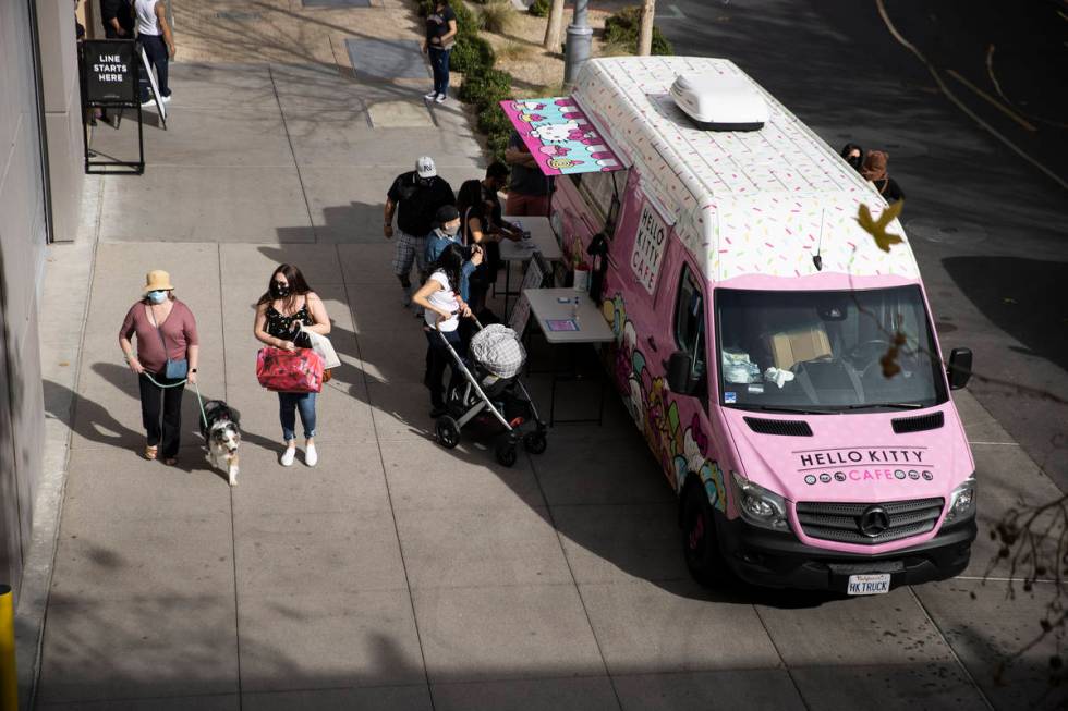 People visit the Hello Kitty Cafe truck at Downtown Summerlin in Las Vegas, on Saturday, March ...