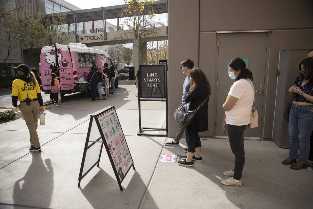 People line up to visit the Hello Kitty Cafe truck at Downtown Summerlin in Las Vegas, on Satur ...