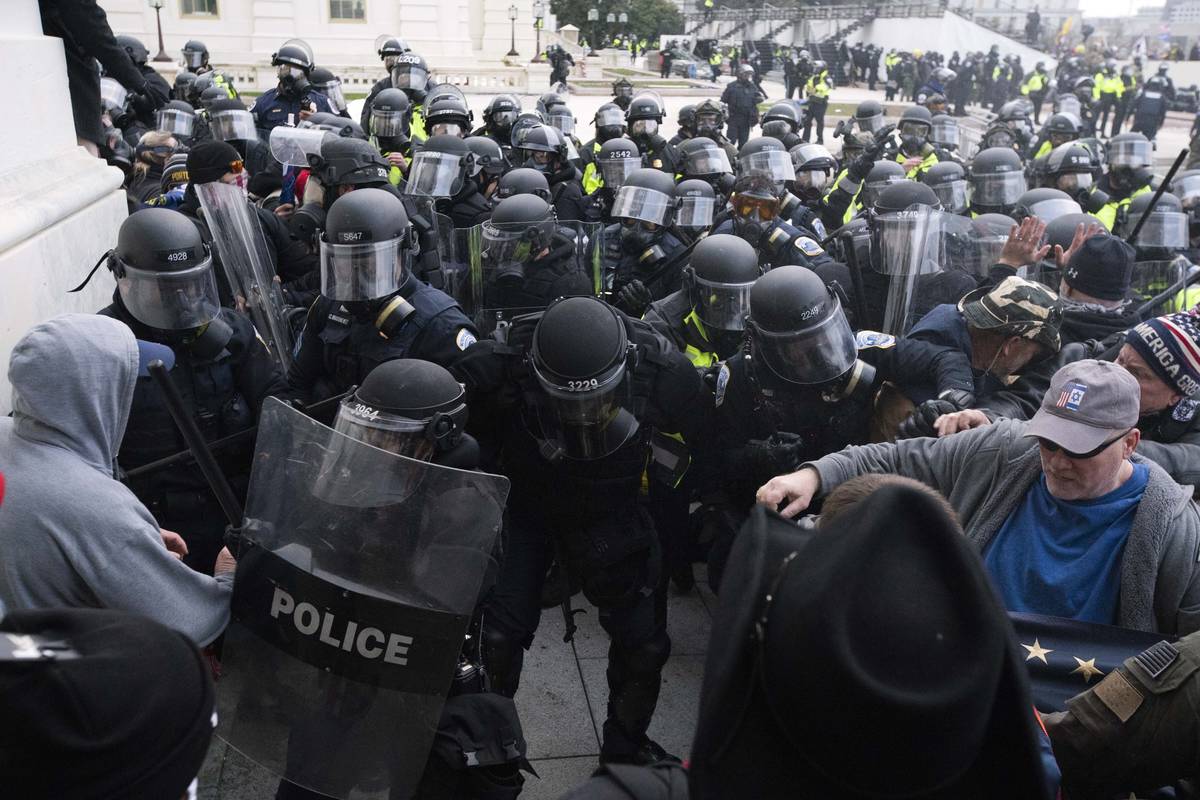 In a Jan. 6, 2021, file photo, U.S. Capitol Police push back rioters trying to enter the U.S. C ...