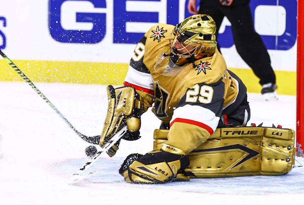 Golden Knights goaltender Marc-Andre Fleury (29) blocks the puck against the Arizona Coyotes du ...