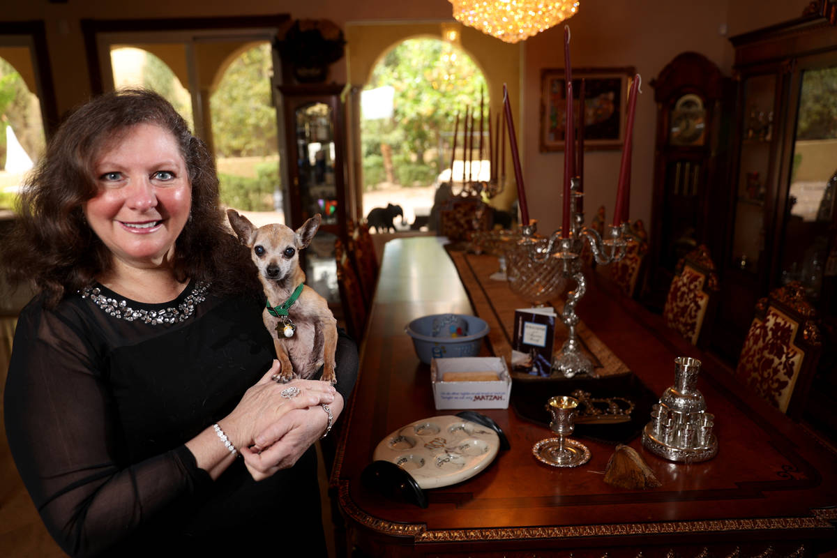 Michele Morgan-Devore and her dog Andy at her Las Vegas home. Morgan-Devore won't be hosting a ...