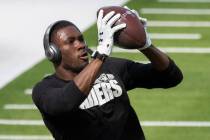 Las Vegas Raiders wide receiver Nelson Agholor (15) warms up before the start of an NFL footbal ...
