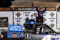 John Nemechek celebrates after winning the NASCAR Trucks auto race at Las Vegas Motor Speedway ...