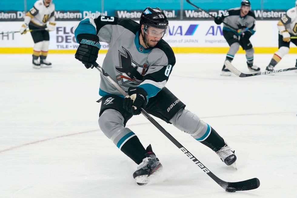 San Jose Sharks defenseman Christian Jaros skates with the puck against the Vegas Golden Knight ...