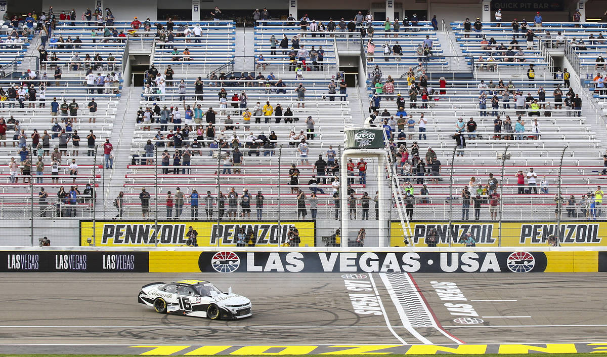 AJ Allmendinger does a burnout after winning a NASCAR Xfinity Series auto race at the Las Vegas ...