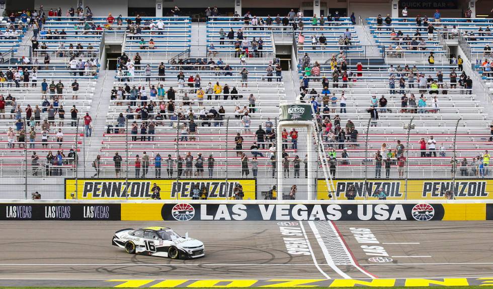 AJ Allmendinger does a burnout after winning a NASCAR Xfinity Series auto race at the Las Vegas ...