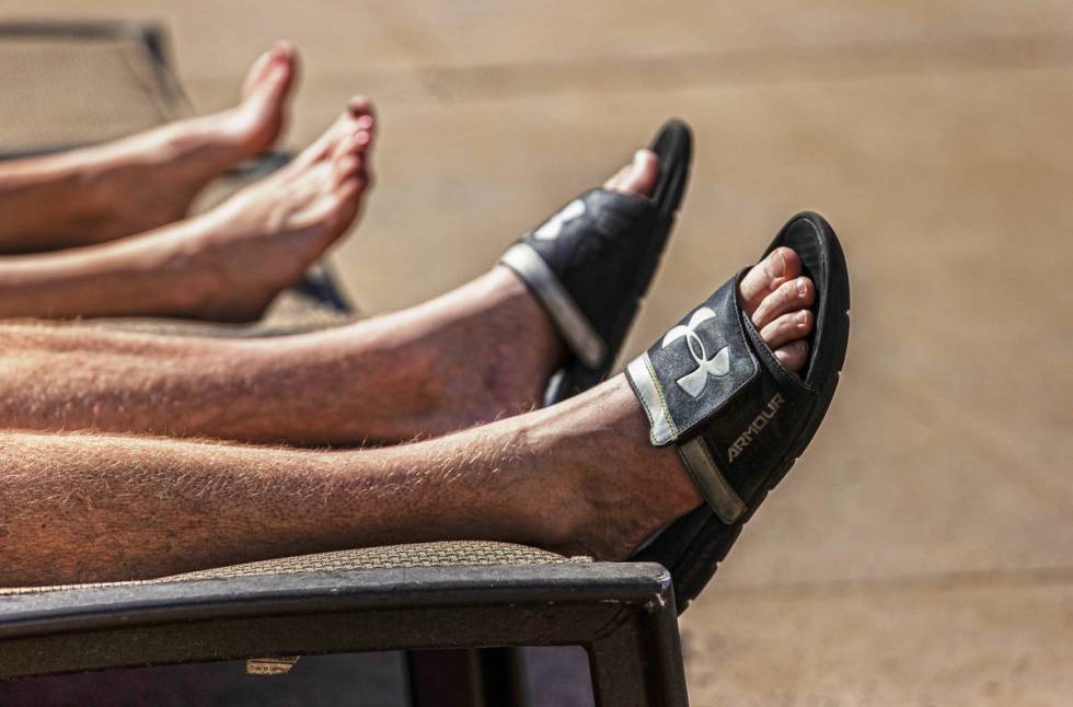 Guests relax by the pool at The Mirage on Saturday, March 6, 2021, in Las Vegas. (Benjamin Hage ...