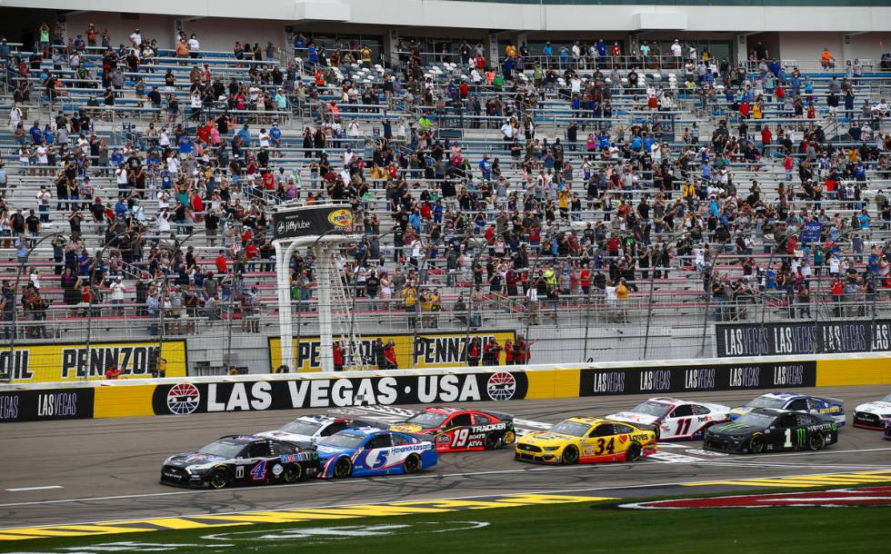 Drivers take the green flag to start the NASCAR Cup Series Pennzoil 400 auto race at the Las Ve ...