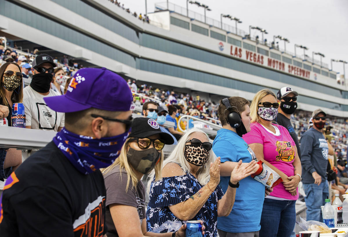 Fans enjoy the NASCAR Cup Series Pennzoil 400 auto race from the grandstands at Las Vegas Motor ...