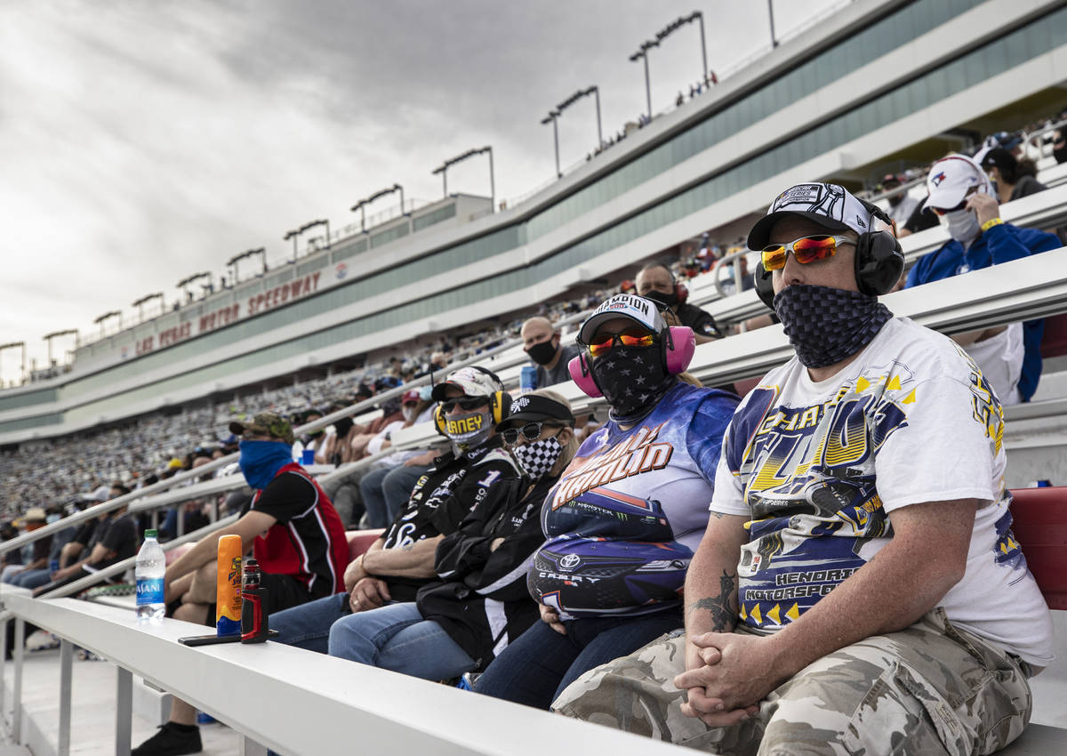 Fans enjoy the NASCAR Cup Series Pennzoil 400 auto race from the grandstands at Las Vegas Motor ...