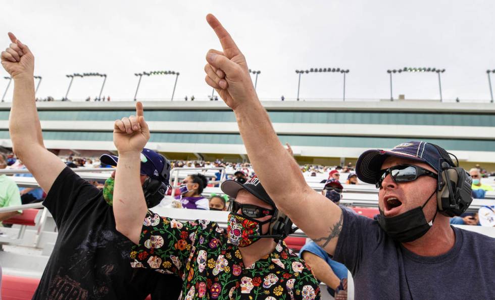 Fans cheer from the grandstands during the NASCAR Cup Series Pennzoil 400 auto race at Las Vega ...