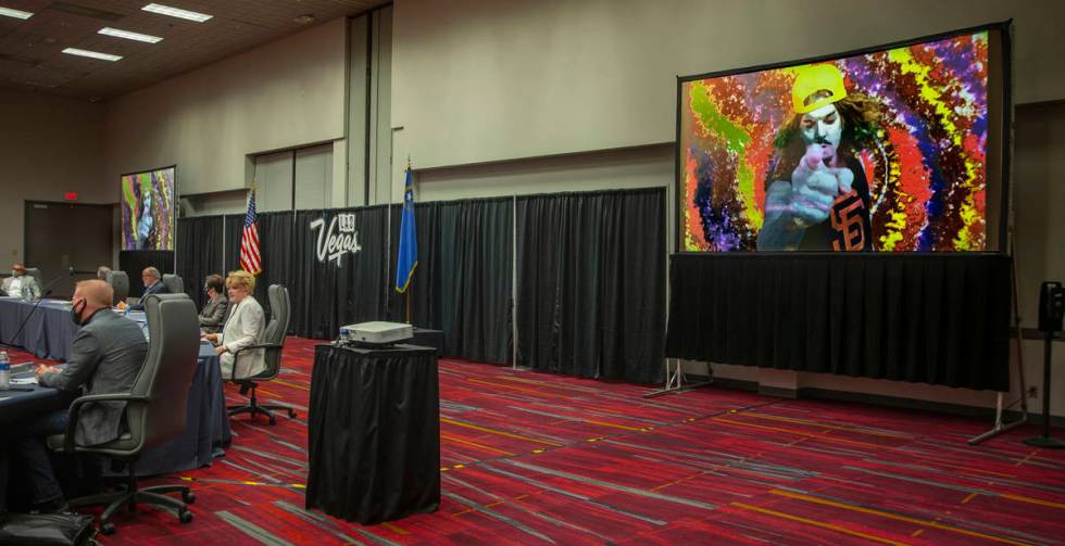 Carrot Top speaks in a promotion spot on the screen during an LVCVA meeting within the Las Vega ...