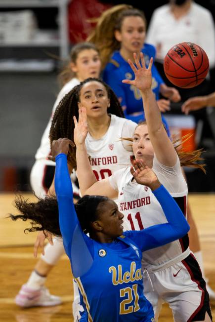 Stanford Cardinal forward Ashten Prechtel (11) blocks an attempted point by UCLA Bruins forward ...