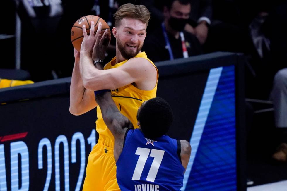 Brooklyn Nets guard Kyrie Irving guards Indiana Pacers forward Domantas Sabonis during the firs ...