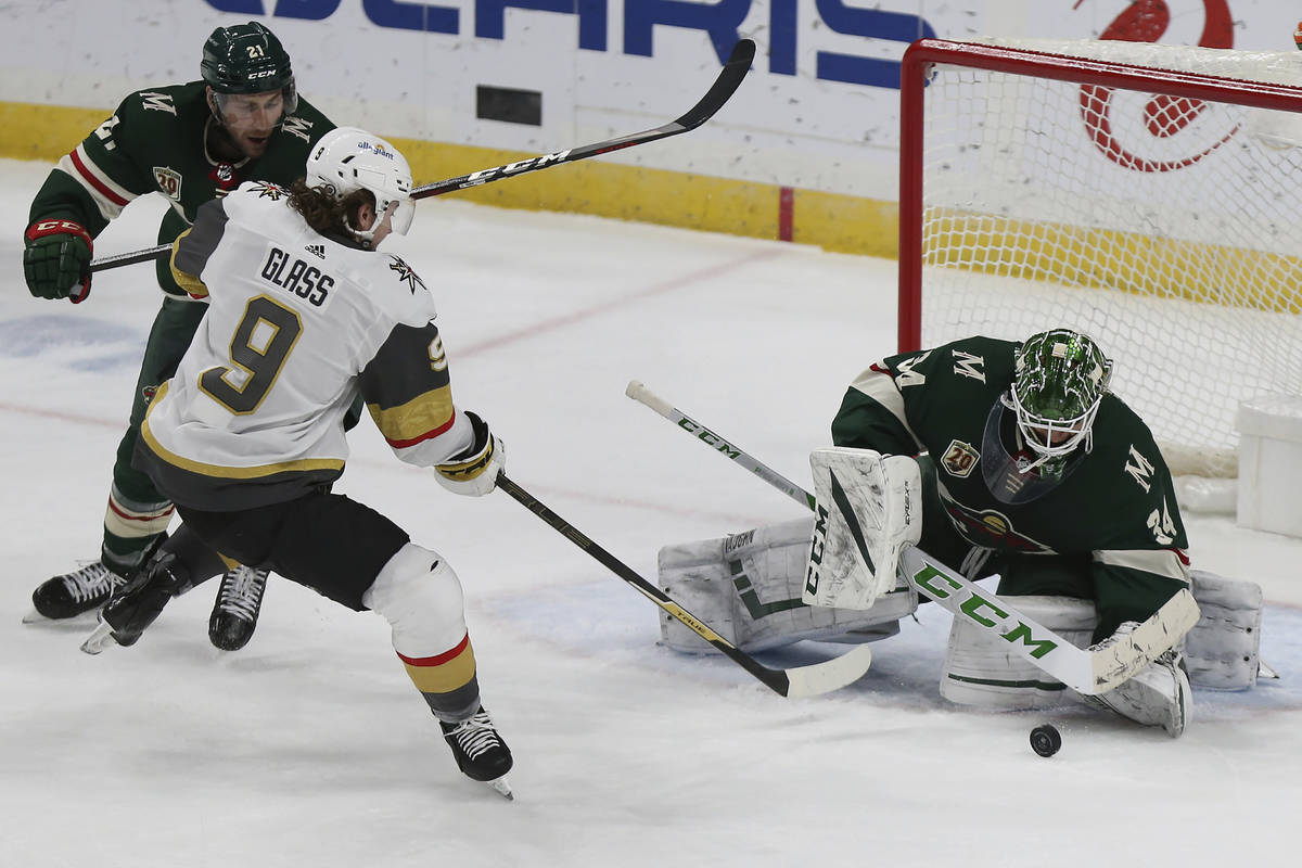 Minnesota Wild's goalie Kaapo Kahkonen (34) blocks a shot attempt by Vegas Golden Knights' Cody ...