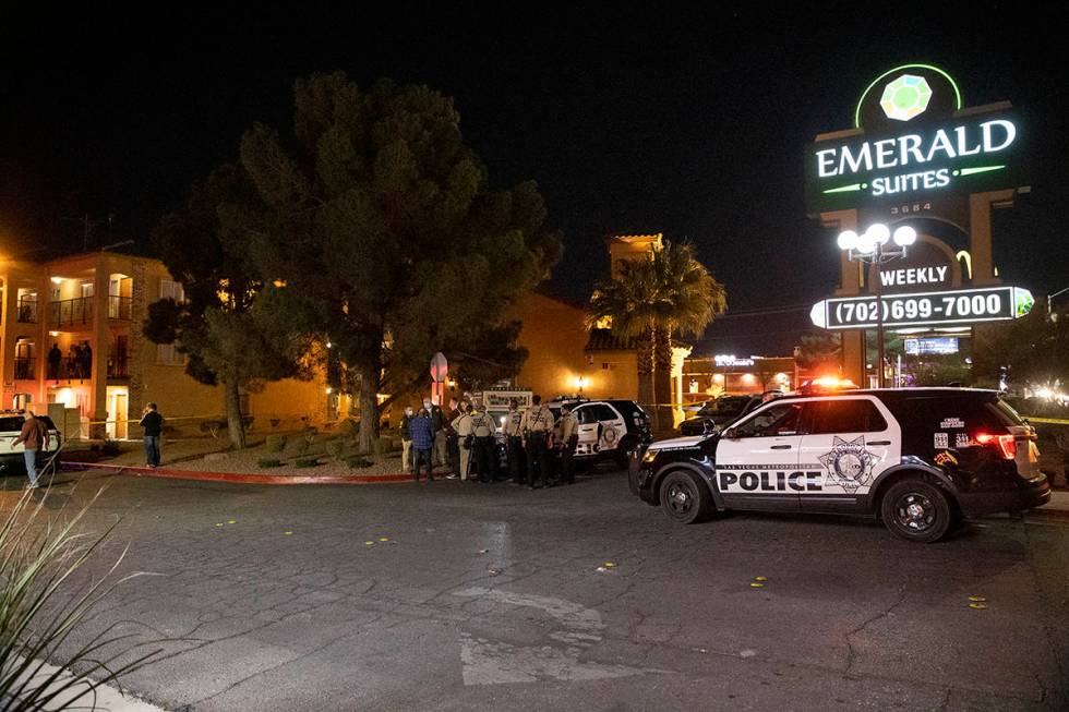 Las Vegas police investigate the scene of a homicide at the 3600 block of Paradise Road in Las ...