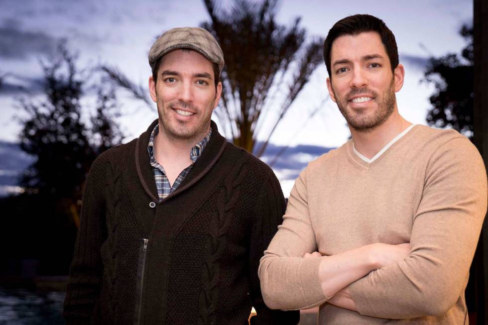 Jonathan and Drew Scott, who star in HGTV's "Property Brothers," relax in their Las Vegas home. ...