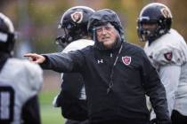 Faith Lutheran head football coach Mike Sanford leads practice on Thursday, March 11, 2021, at ...