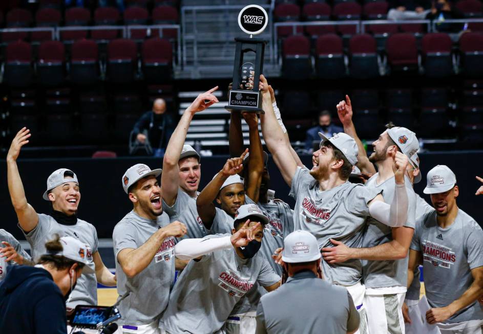 Grand Canyon players celebrate after defeating New Mexico State 74-56 in an NCAA college basket ...