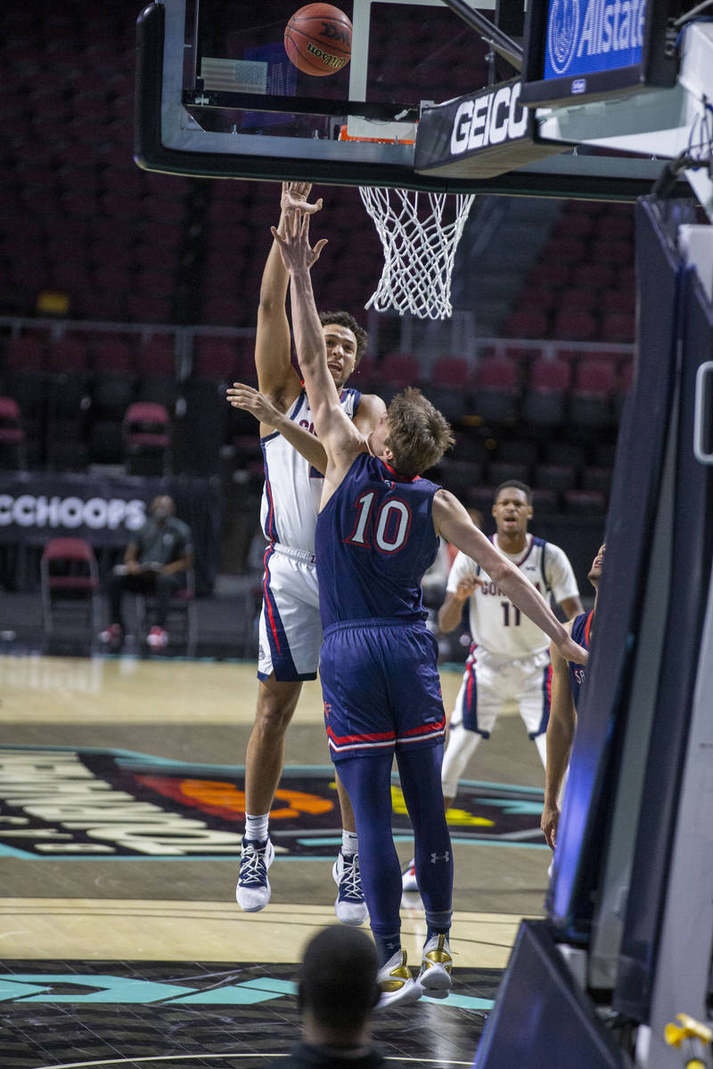 Gonzaga Bulldogs guard Andrew Nembhard (3) shoots over St. Mary's Gaels center Mitchell Saxen ( ...