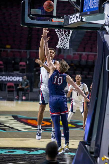 Gonzaga Bulldogs guard Andrew Nembhard (3) shoots over St. Mary's Gaels center Mitchell Saxen ( ...