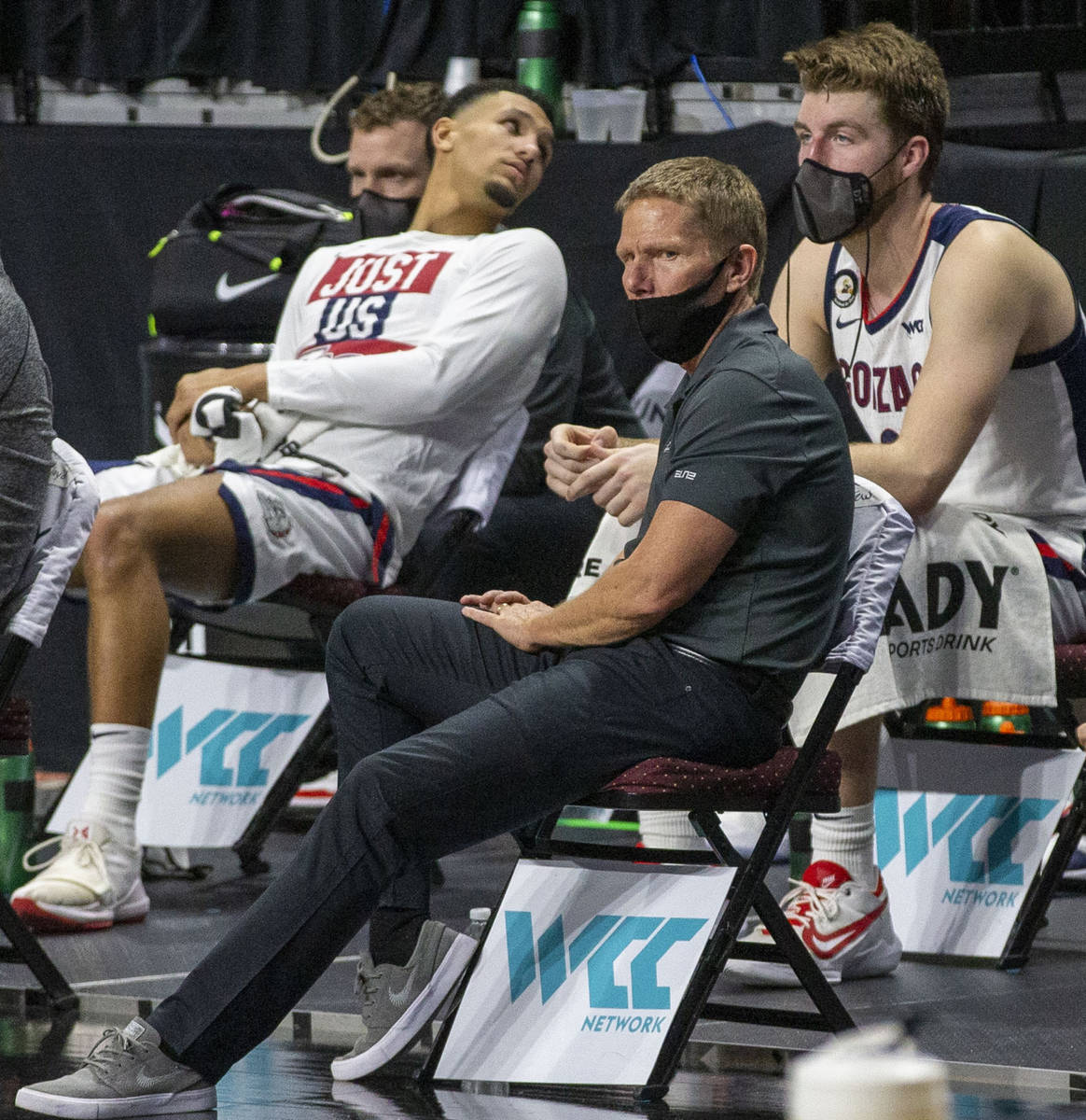 Gonzaga Bulldogs head coach Mark Few, front, looks on during the second half of the WCC men&#xd ...