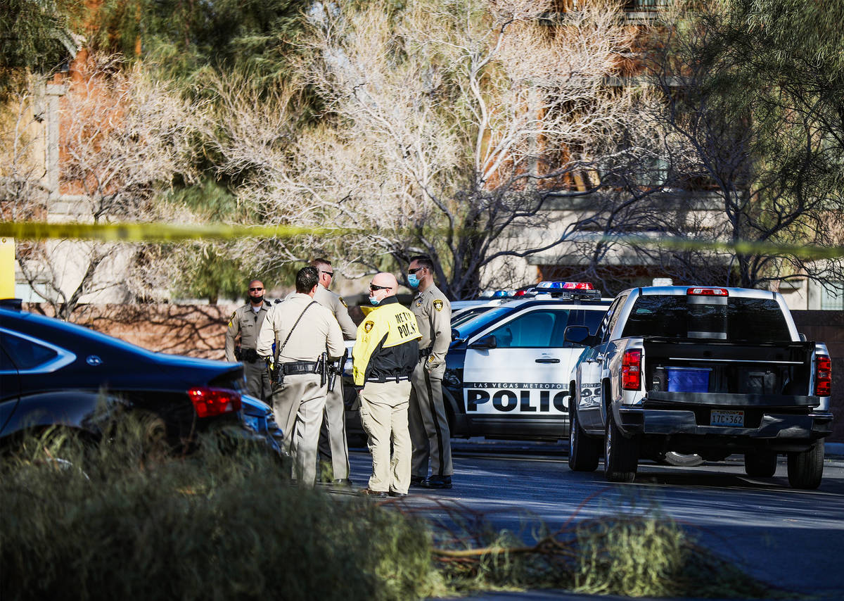 Police investigate the scene of a homicide on the 3900 block of West Cheyenne on Tuesday, March ...