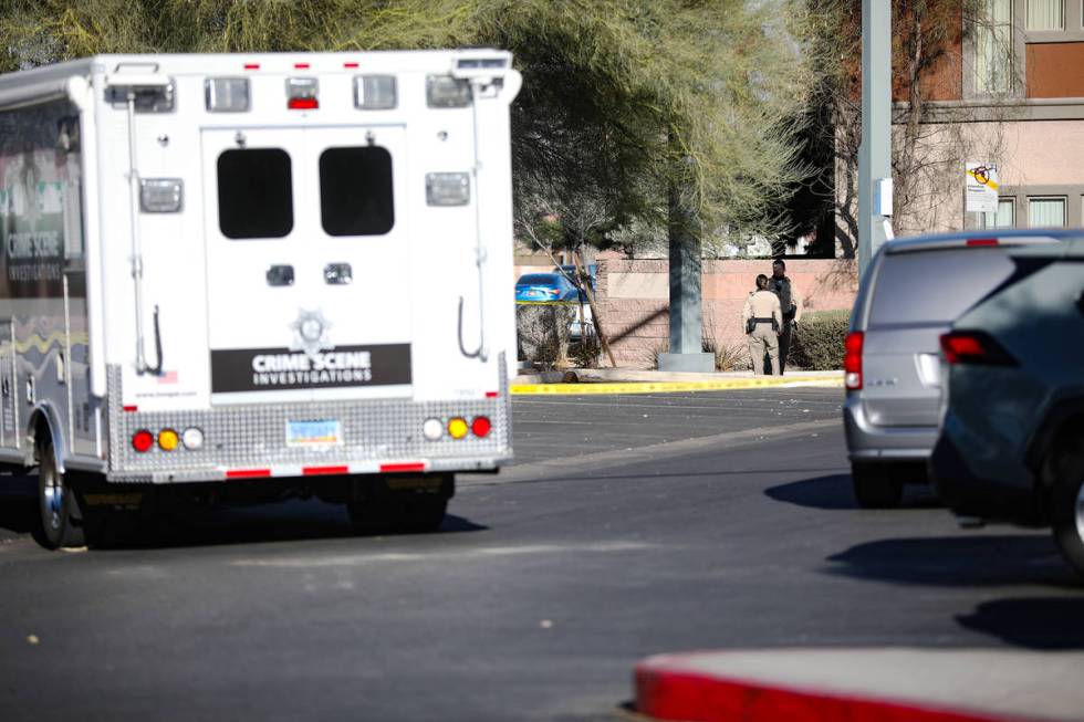 Police investigate the scene of a homicide on the 3900 block of West Cheyenne Avenue on Tuesday ...