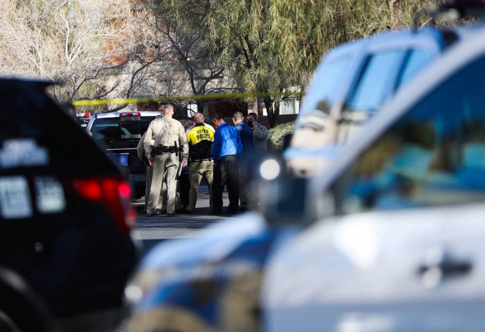 Police investigate the scene of a homicide on the 3900 block of West Cheyenne Avenue on Tuesday ...